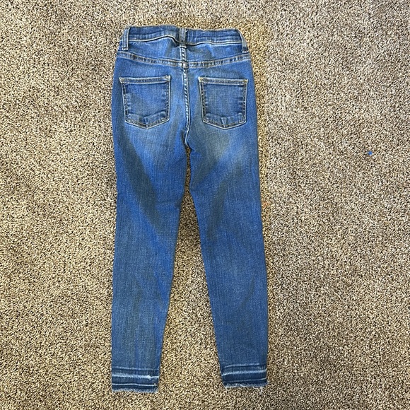 Distressed skinny jeans - Picture 3 of 5
